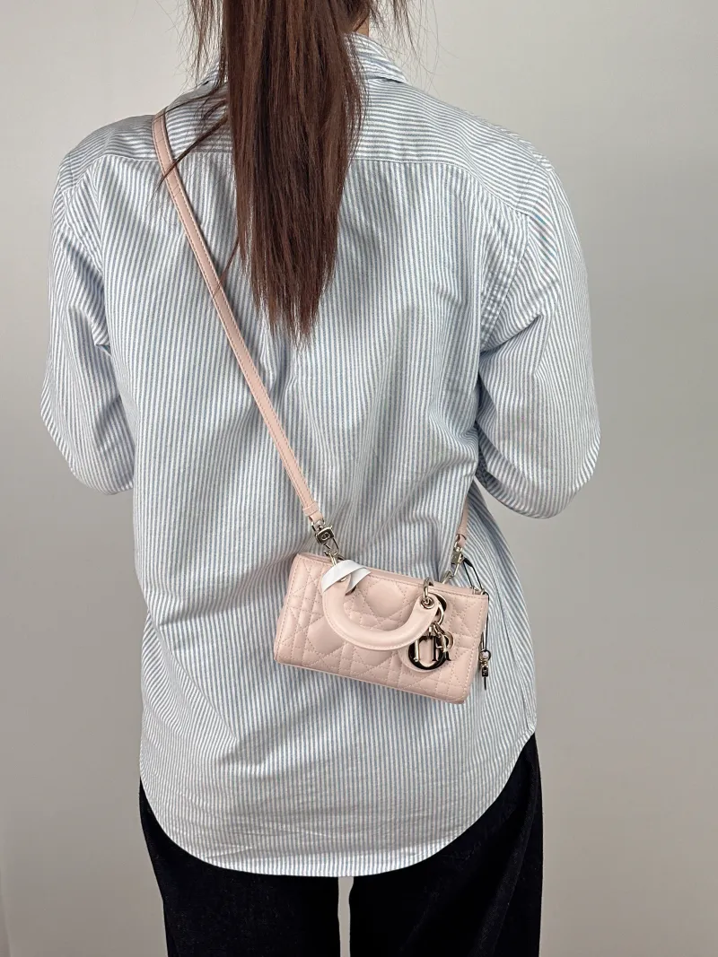 DIOR Crossbody Bag Lady D-Joy Pink Lambskin Mini 16 × 5 × 9 cm — on-model view 1 of 3