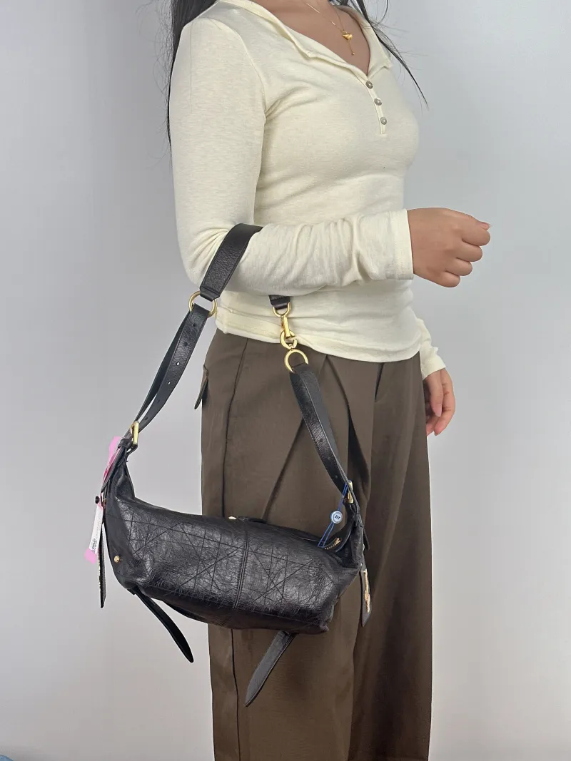 DIOR Shoulder Bag D-Journey Shoulder Bag Hobo Black Calfskin Small 25.5 × 14 × 14.5 cm — on-model view 1 of 2