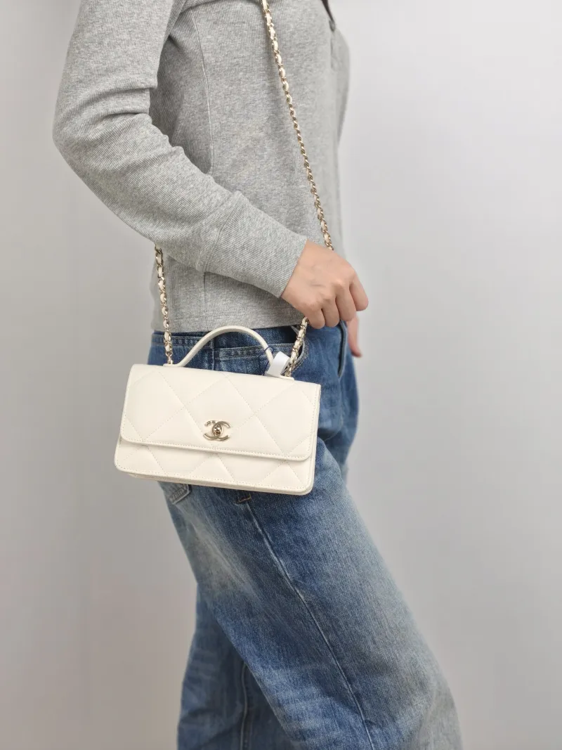 Chanel Crossbody Bag woc White Grained Calfskin 19.2 × 6 × 10.5 cm — on-model view 2 of 3