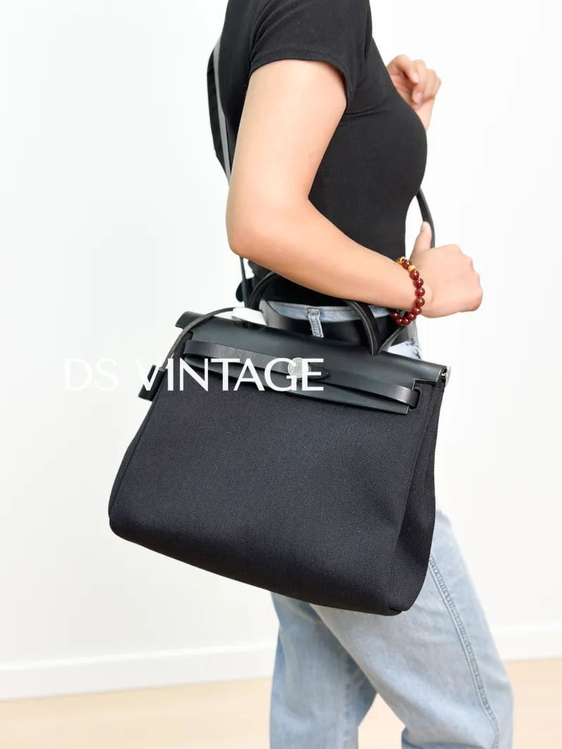 Hermès Shoulder Bag Herbag 31Black Canvas Canvas Berliner Medium31 × 10 × 25 cm — on-model view 2 of 4