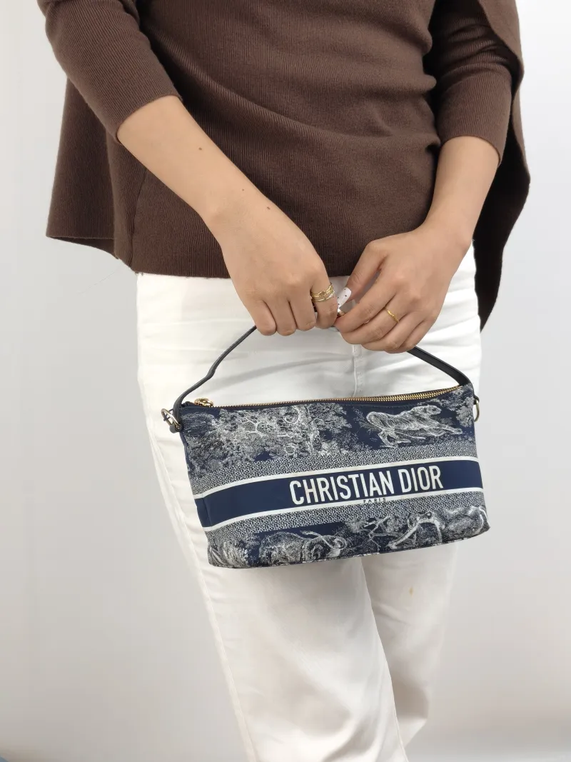 DIOR Top Handle Bag Travel Nomad Collection · White Blue Medium 22 × 9.5 × 13 cm — on-model view 1 of 2