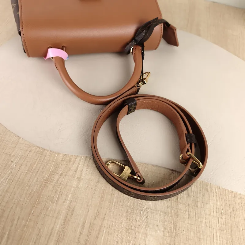 Louis Vuitton Crossbody Bag MADELEINE PVC · Calfskin BB 24.5 × 8 × 16 cm — detail view 10 of 11