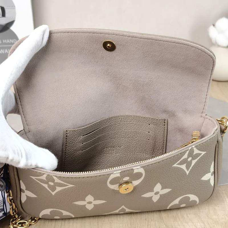 Louis Vuitton Crossbody Bag IVY Empreinte Embossed Calfskin Small 23.5 × 4.3 × 12 cm — detail view 4 of 11