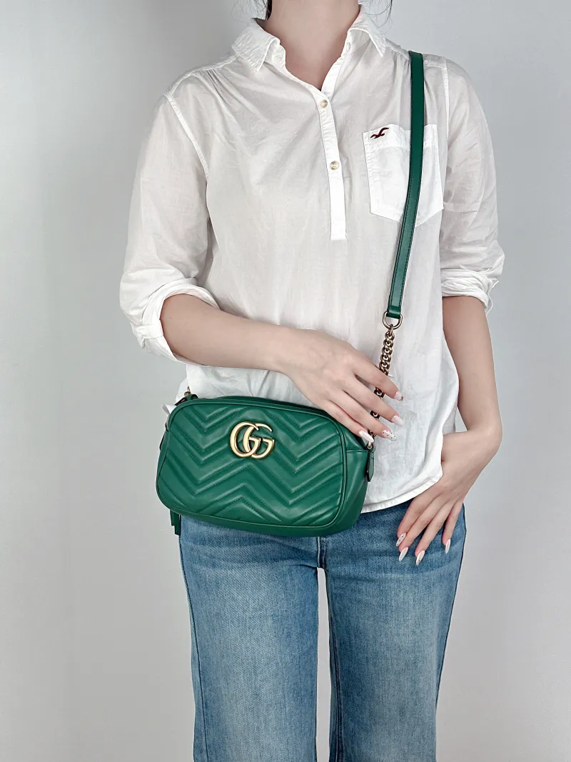 GUCCI Crossbody Bag GG Marmont Marmont Camera Bag Green Calfskin Small24 × 7 × 13 cm — on-model view 1 of 2