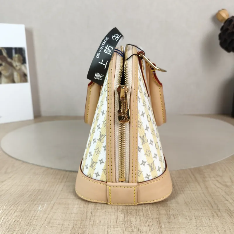Louis Vuitton Top Handle Bag Alma BB Yellow White Canvas BB 23.5 × 11.5 × 17.5 cm — detail view 1 of 13