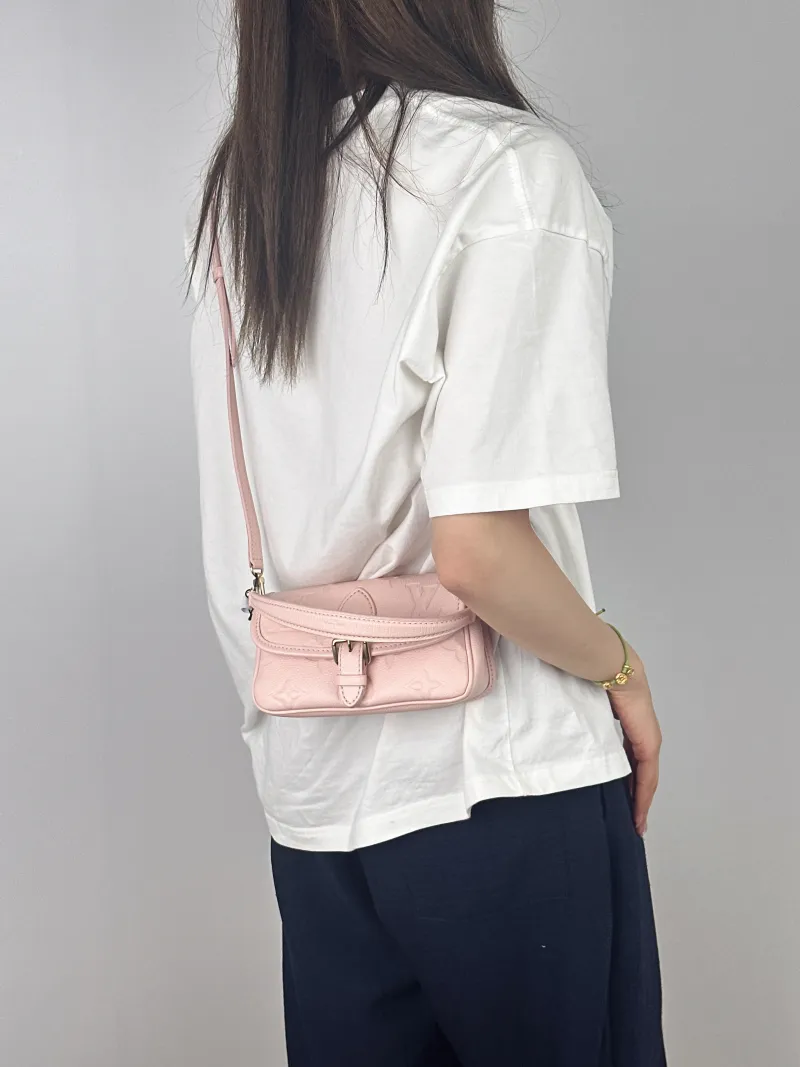 Louis Vuitton Crossbody Bag Diane Baguette Bag Empreinte Embossed Calfskinnano19 × 6 × 10.5 cm — on-model view 2 of 2