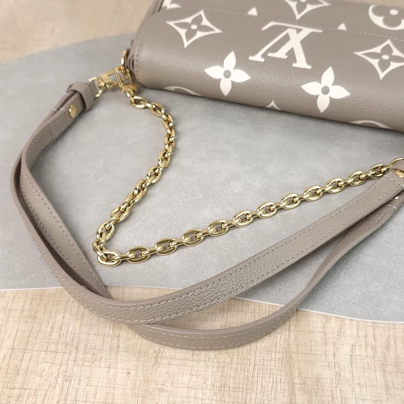 Louis Vuitton Crossbody Bag IVY Empreinte Embossed Calfskin Small 23.5 × 4.3 × 12 cm — detail view 10 of 11