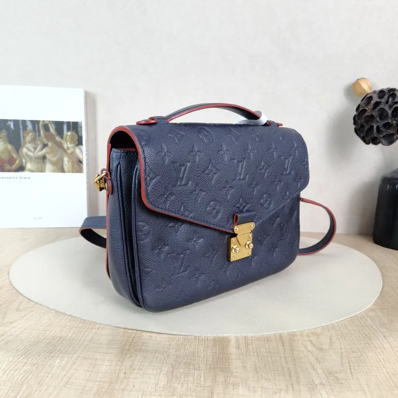 Louis Vuitton Crossbody Bag Pochette Métis · Monogram Empreinte Embossed Calfskin Medium 25 × 7 × 19 cm — cover view 2 of 5