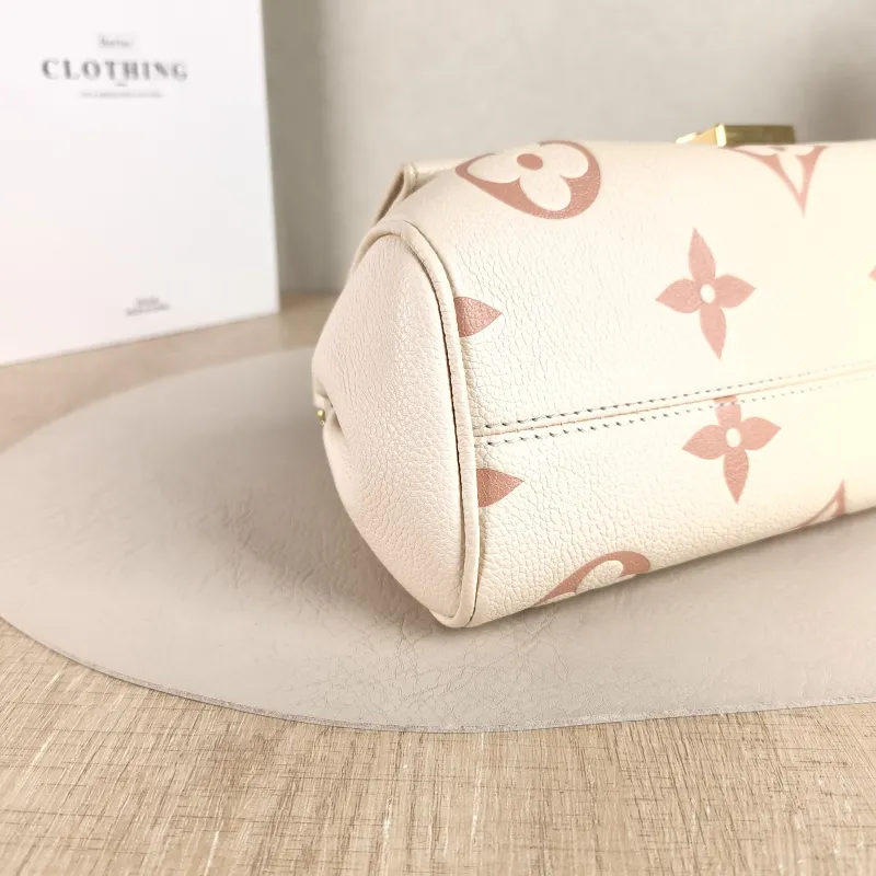 Louis Vuitton Crossbody Bag Favorite White · Pink Empreinte Embossed Calfskin Medium 24 × 9 × 14 cm — detail view 3 of 11