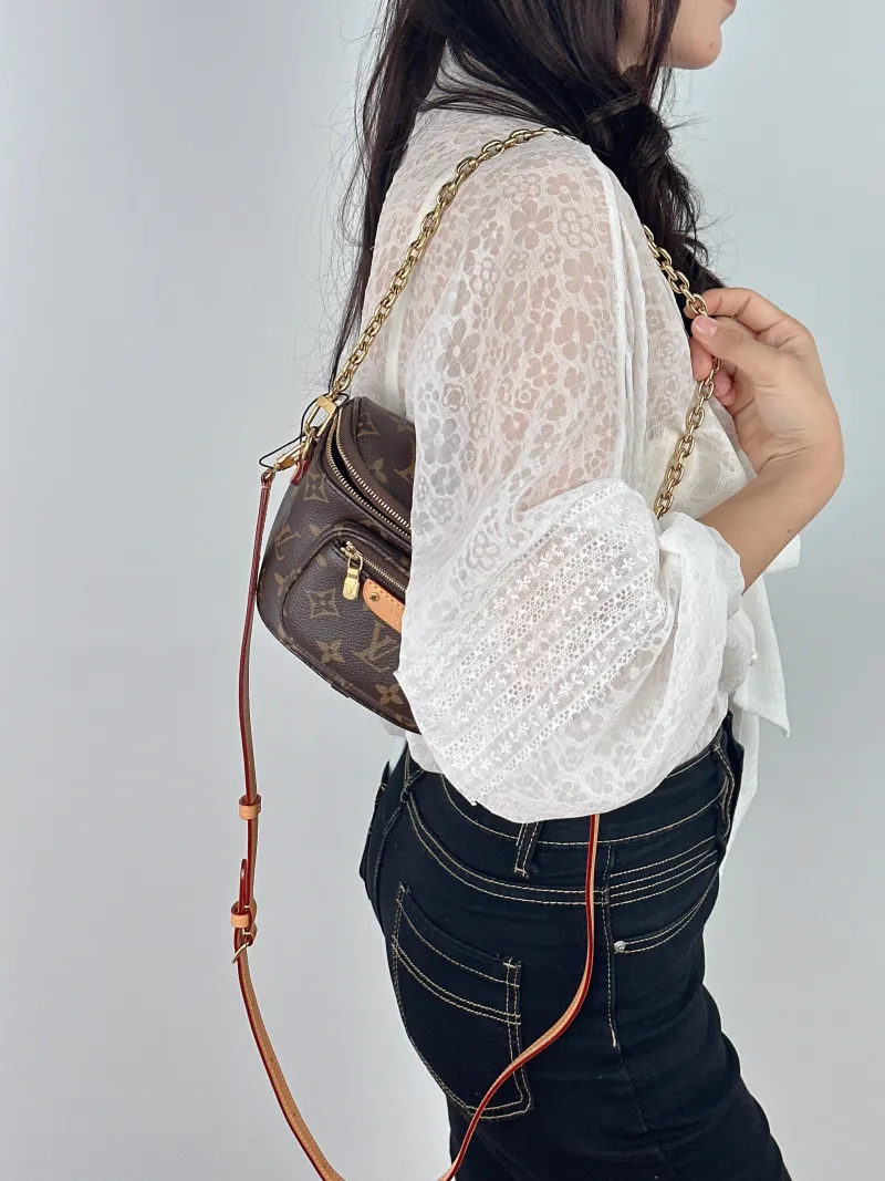 Louis Vuitton Crossbody Bag Bumbag Belt Bag Monogram PVC Mini 17 × 9.5 × 12 cm — on-model view 1 of 2