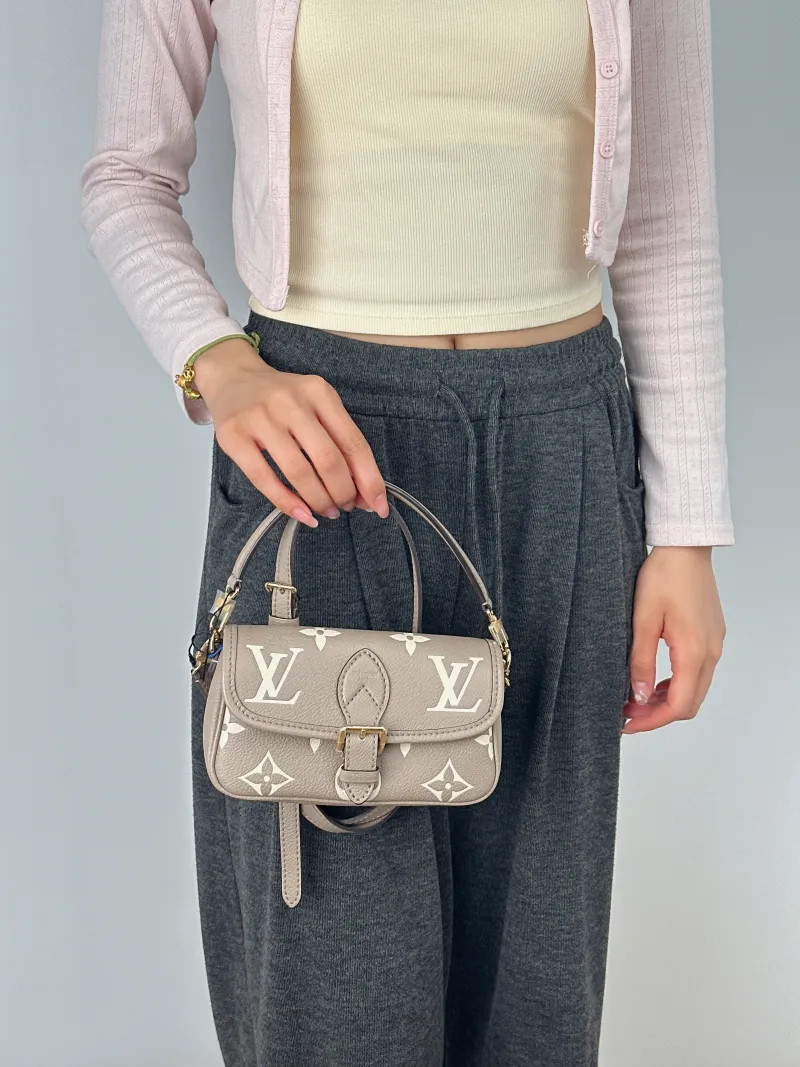 Louis Vuitton Crossbody Bag Diane Baguette Bag Empreinte Embossed Calfskin Monogramnano19 × 6 × 10.5 cm — on-model view 2 of 2