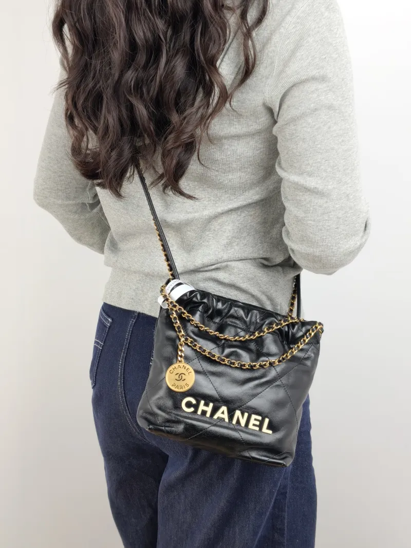 Chanel Shoulder Bag 22Bag Black CC alfskin Mini 20 × 6 × 19 cm — on-model view 2 of 2