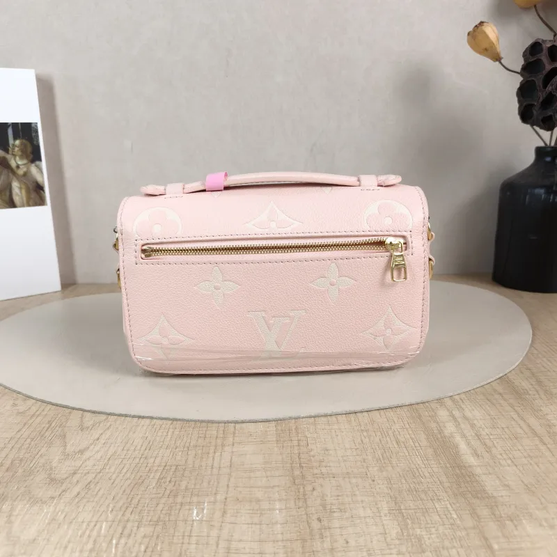 Louis Vuitton Crossbody Bag Pochette Métis East West Monogram Empreinte Embossed Calfskin Small 21.5 × 6 × 13.5 cm — cover view 5 of 5