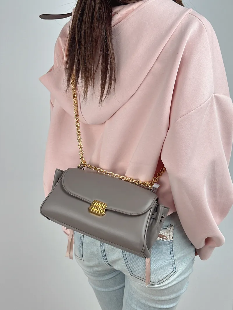 Miumiu Shoulder Bag Grey Calfskin One Size 26 × 9.5 × 14.5 cm — on-model view 2 of 2
