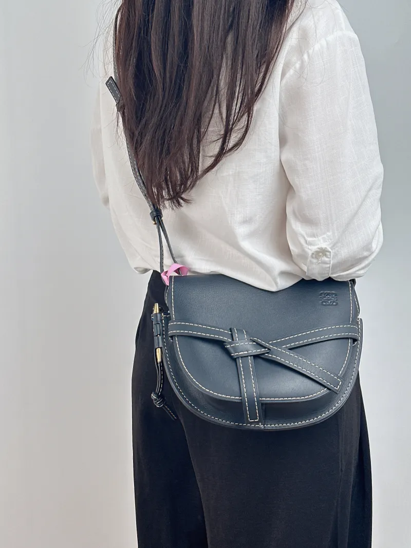 LOEWE Crossbody Bag Gate Black Calfskin Medium 25 × 11.5 × 19 cm — on-model view 2 of 2
