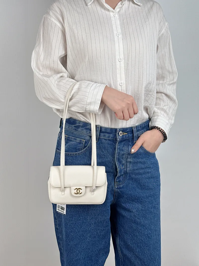 Chanel Top Handle Bag preppy coco White Calfskin Mini 17 × 5 × 11.4 cm — on-model view 1 of 2
