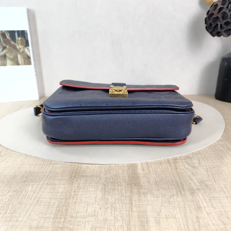 Louis Vuitton Crossbody Bag Pochette Métis · Monogram Empreinte Embossed Calfskin Medium 25 × 7 × 19 cm — cover view 3 of 5