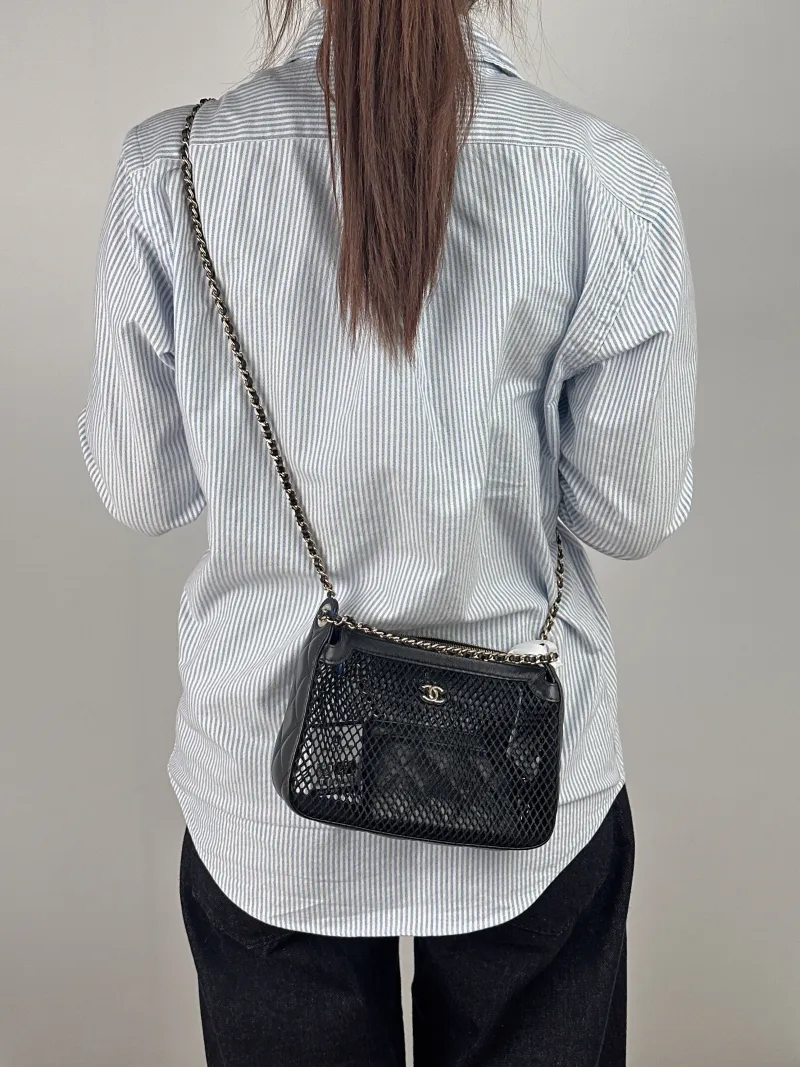 Chanel Crossbody Bag Black Lambskin One Size 21.5 × 5 × 15 cm — on-model view 2 of 2