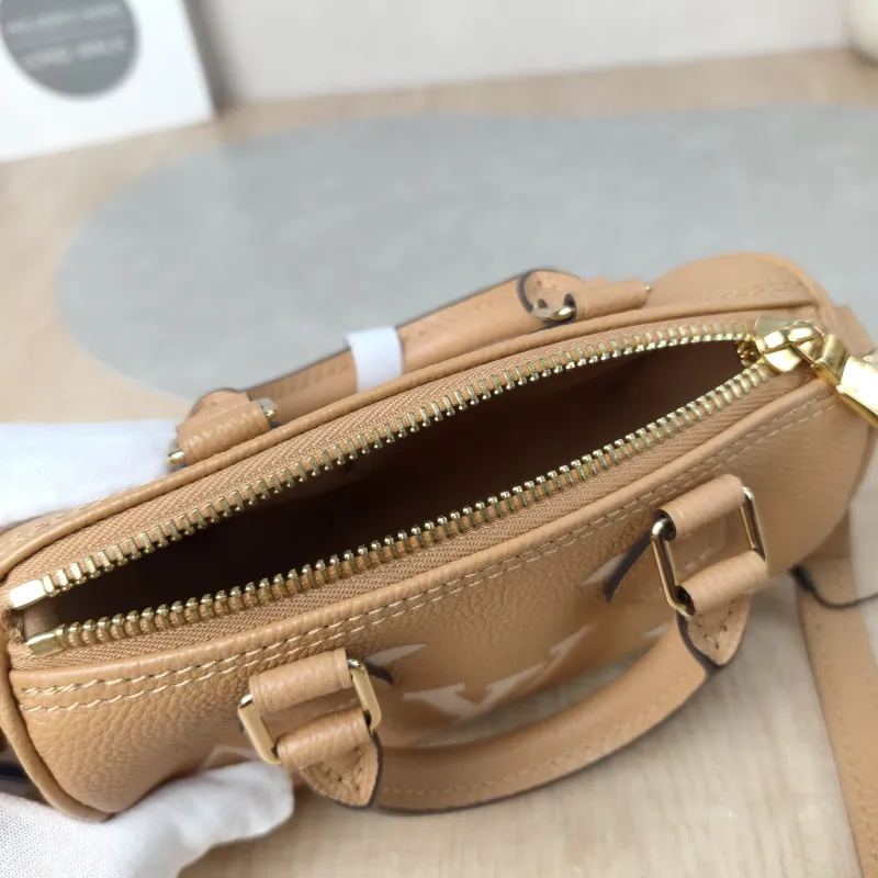 Louis Vuitton Crossbody Bag Speedy Nano · White Empreinte Embossed Calfskinnano16 × 7.5 × 10 cm — detail view 11 of 14