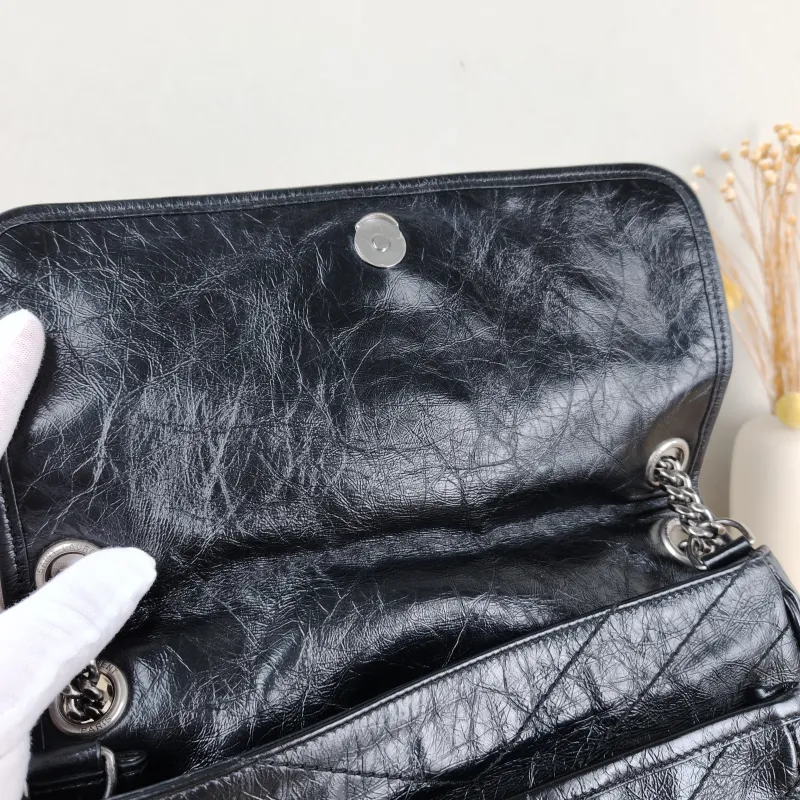 SAINT LAURENT Crossbody Bag Niki D Waxed Leather Calfskin Medium 28 × 8.5 × 20 cm — detail view 1 of 13
