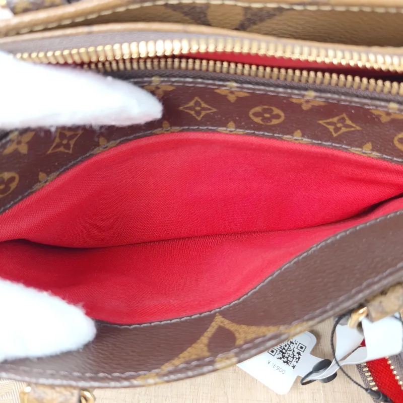Louis Vuitton Crossbody Bag Onthego East West Monogram PVC Small 25 × 10 × 13 cm — detail view 3 of 12