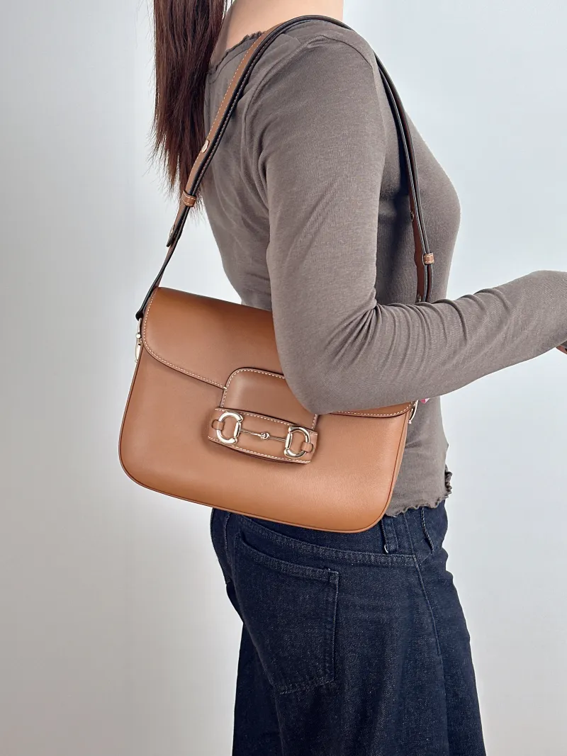 GUCCI Crossbody Bag Horsebit 1955 Horsebit Medium Caramel Calfskin Medium 25 × 8 × 18 cm — on-model view 1 of 2