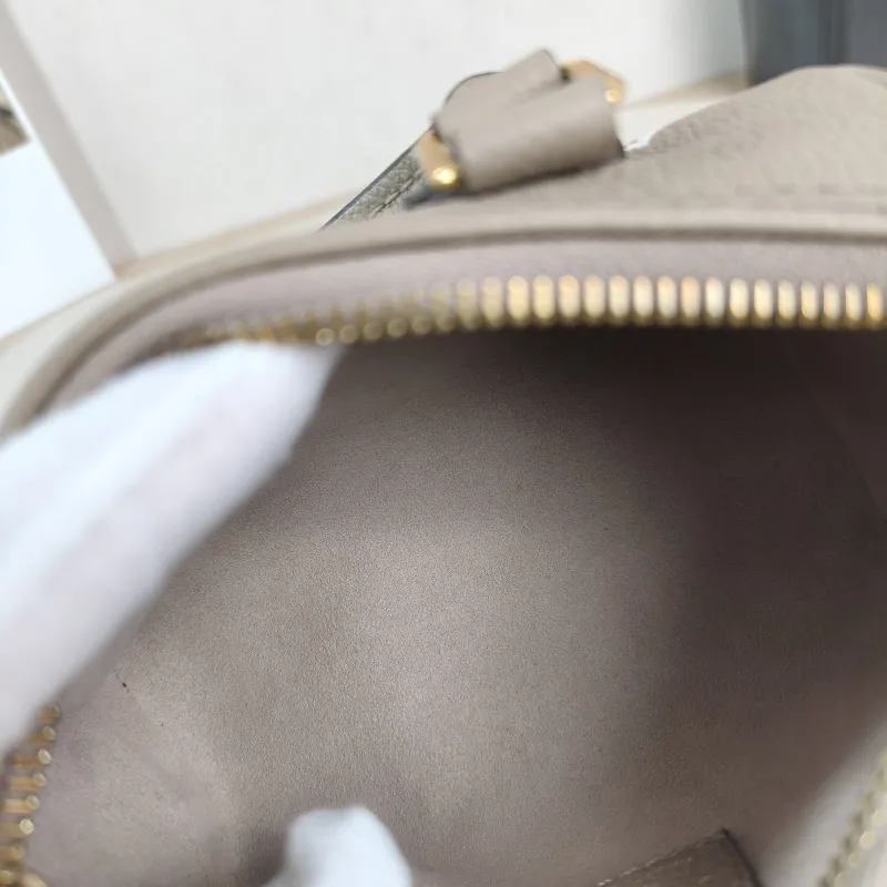 Louis Vuitton Crossbody Bag Speedy Nano · White Empreinte Embossed Calfskin nano 16 × 7.5 × 10 cm — detail view 1 of 11