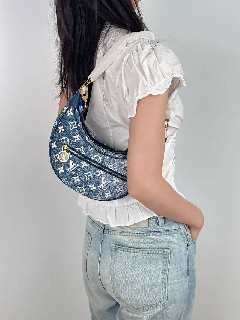 Louis Vuitton Crossbody Bag Loop Blue Small 23 × 6 × 13 cm — on-model view 2 of 3