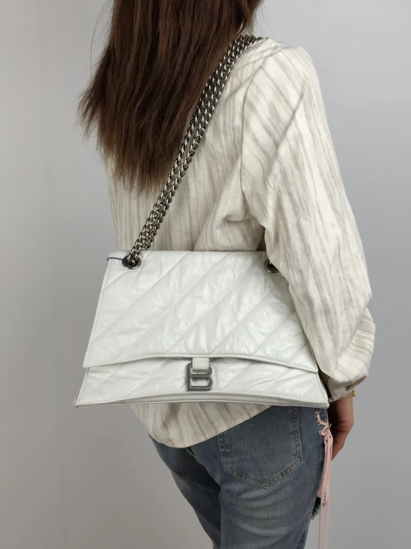 BALENCIAGA Shoulder Bag CRUSH Chain Bag White Calfskin Medium 32 × 10 × 20 cm — on-model view 1 of 2