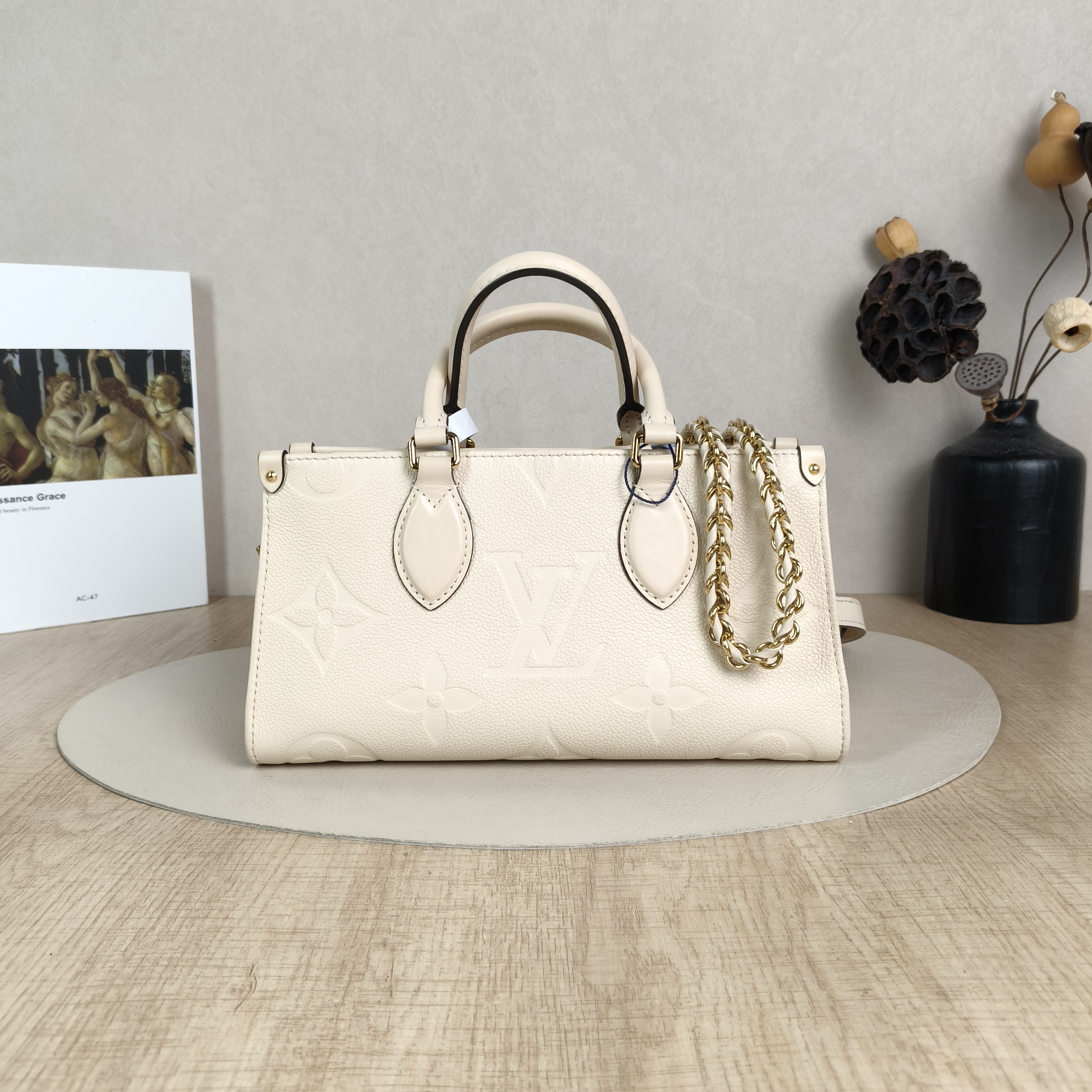 Louis Vuitton Crossbody Bag Onthego East West Two Straps White Empreinte Embossed Calfskin Monogram Small25 × 10 × 13 cm