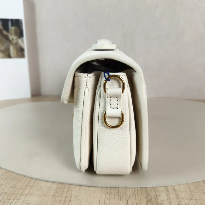 Louis Vuitton Crossbody Bag Pochette Métis East West White · Monogram Empreinte Embossed Calfskin Small 21.5 × 6 × 13.5 cm — detail view 10 of 11