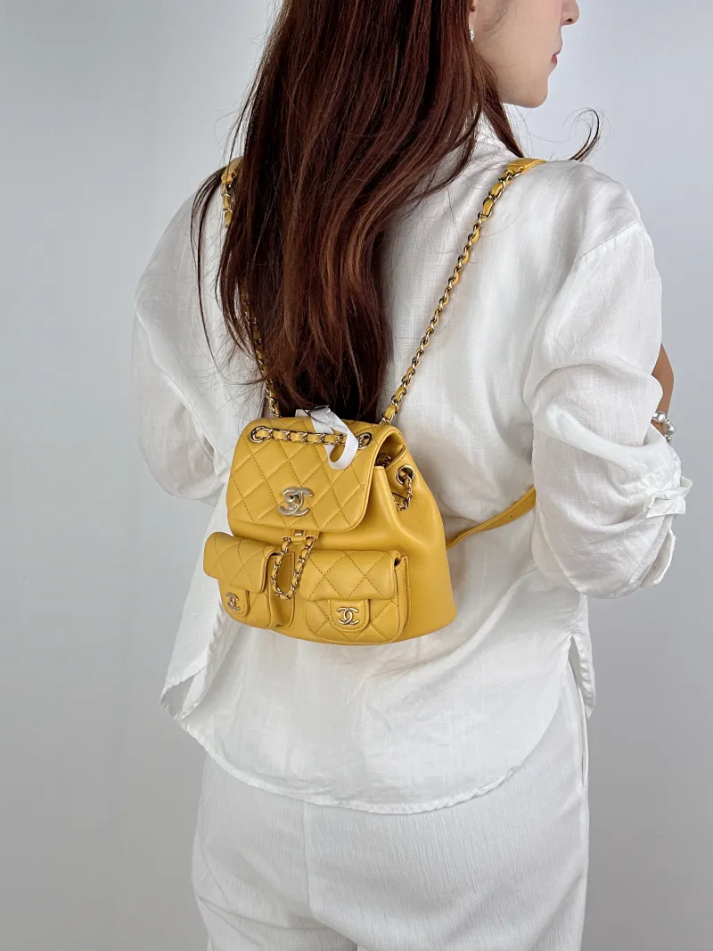 Chanel Backpack Duma Yellow Calfskin Small16.5 × 10 × 17.5 cm — on-model view 1 of 2