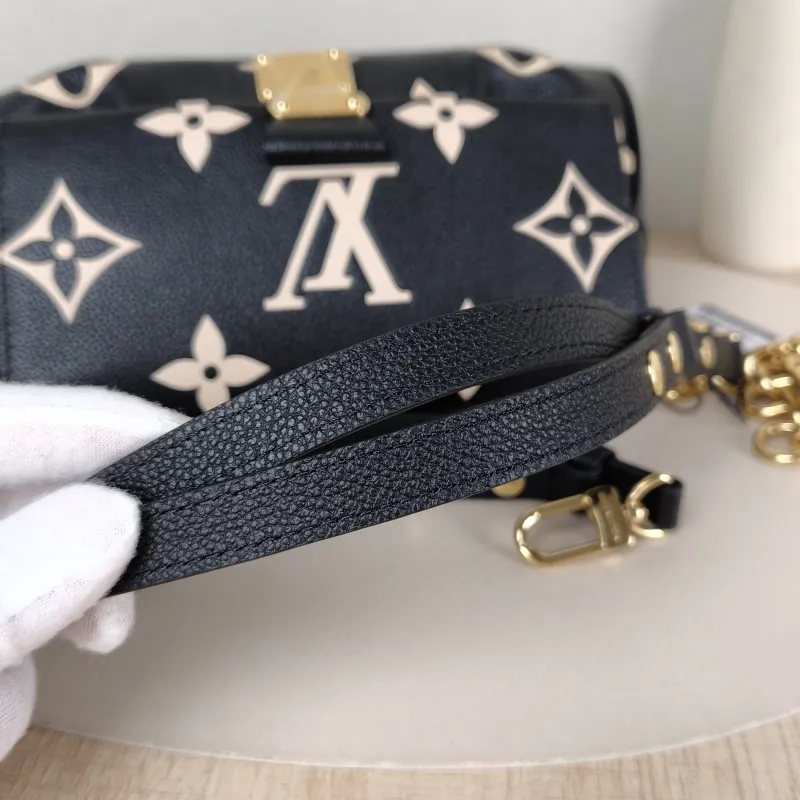 Louis Vuitton Crossbody Bag Favorite Black · White Empreinte Embossed Calfskin Medium 24 × 9 × 14 cm — detail view 7 of 12