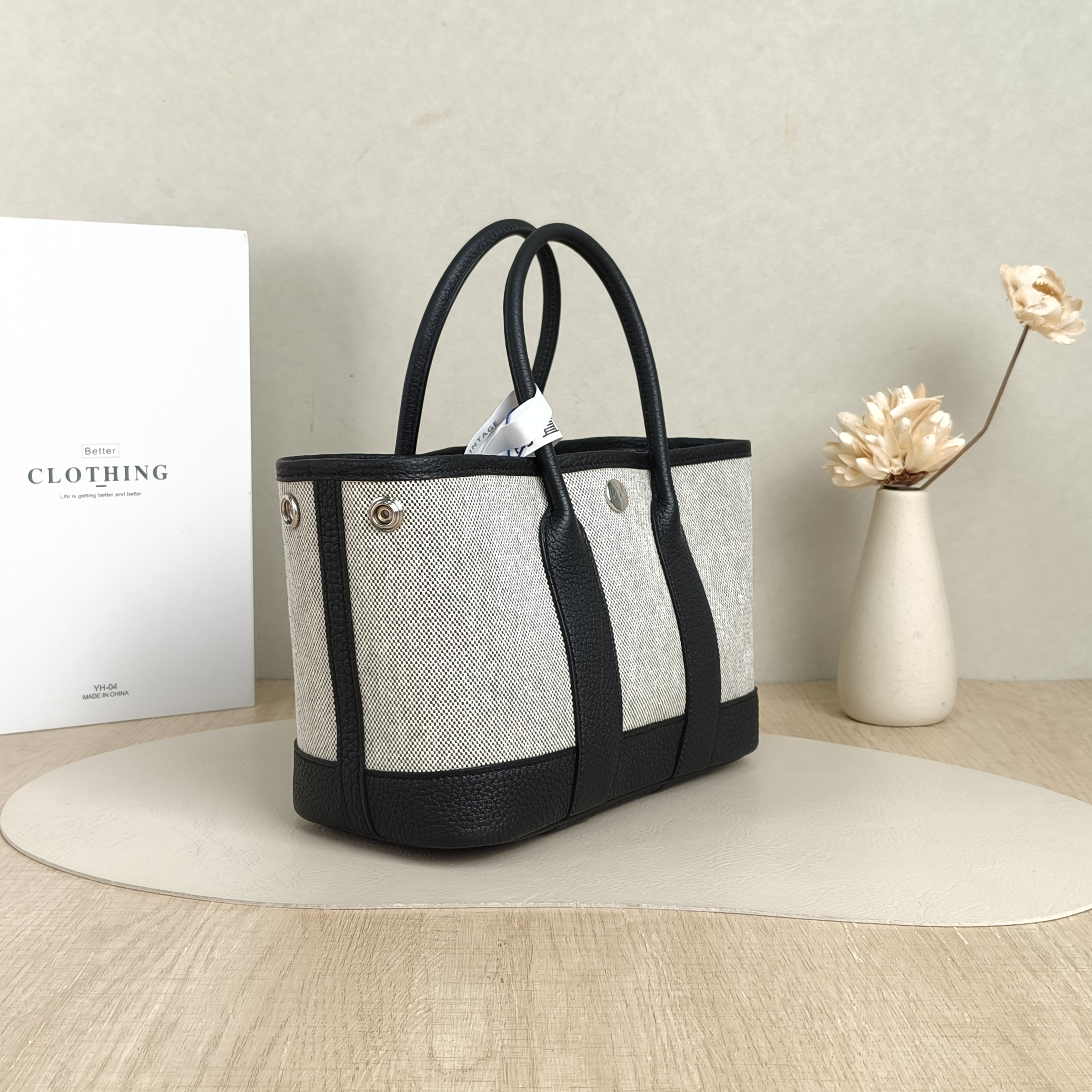 Hermès Top Handle Bag Neo Garden 23 Mini Black · Beige Canvas · Negonda Calfskinmini23 × 10 × 16 cm — cover view 5 of 6
