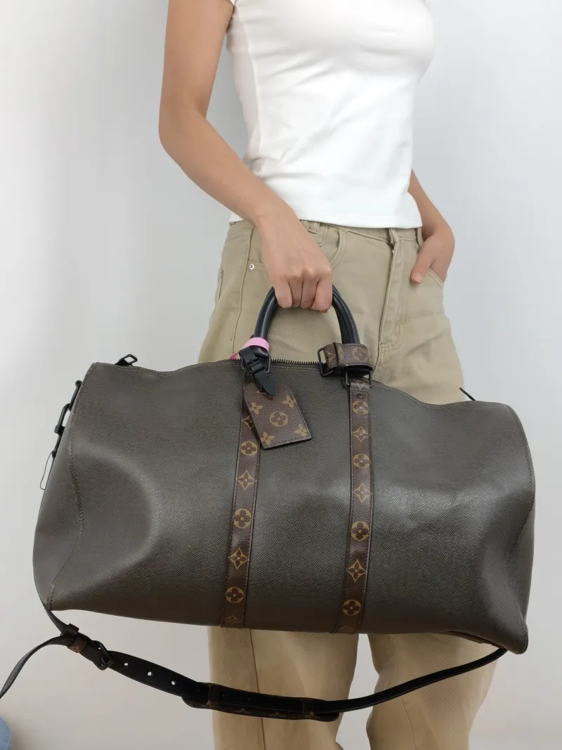 Louis Vuitton Top Handle Bag Keepall 50 Shoulder Strap Edition Green Calfskin One Size 50 × 23 × 29 cm — on-model view 3 of 3