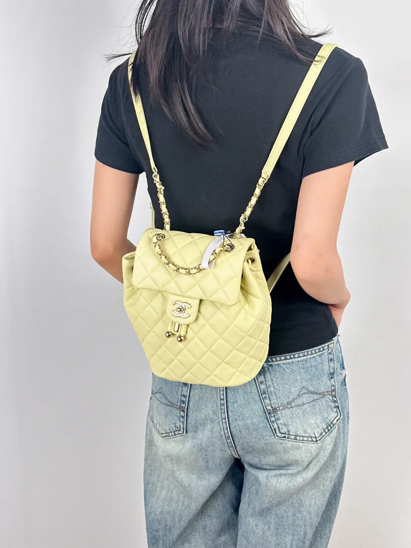Chanel Backpack23s Backpack Yellow Grained Calfskin Small18 × 10 × 23 cm — on-model view 2 of 3