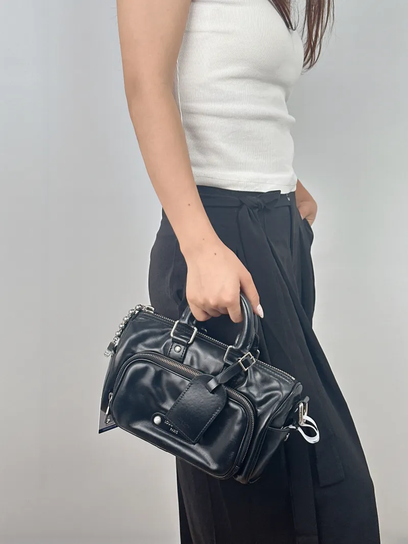 Louis Vuitton Crossbody Bag Keepall Cargo 25 Medium 25 × 11 × 15 cm — on-model view 1 of 2