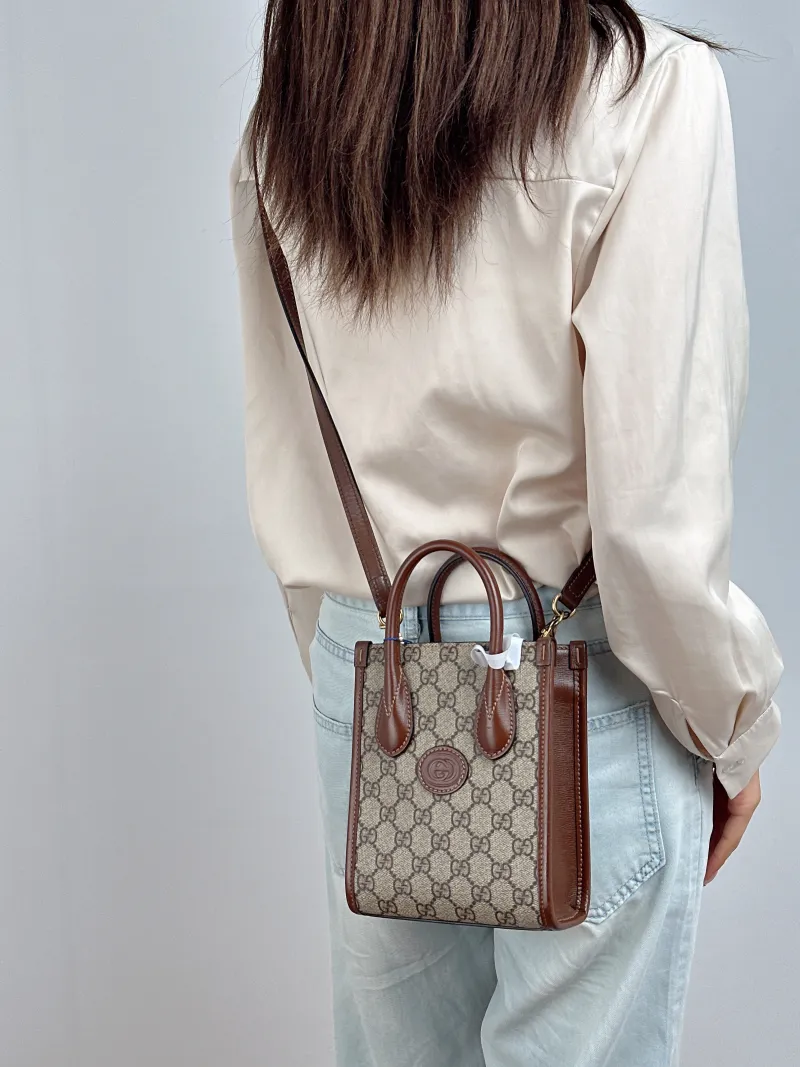 GUCCI Crossbody Bag GG Retro Collection Tote Bag Brown PVC Mini 16 × 7 × 20 cm — on-model view 2 of 2