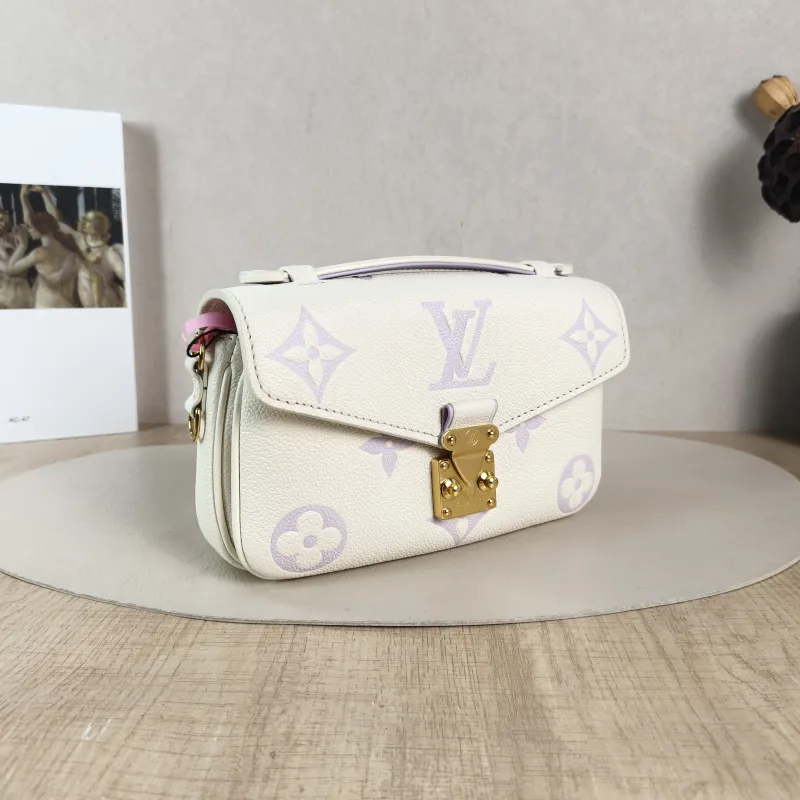 Louis Vuitton Crossbody Bag Pochette Métis East West White · Monogram Empreinte Embossed Calfskin Small 21.5 × 6 × 13.5 cm — cover view 2 of 5