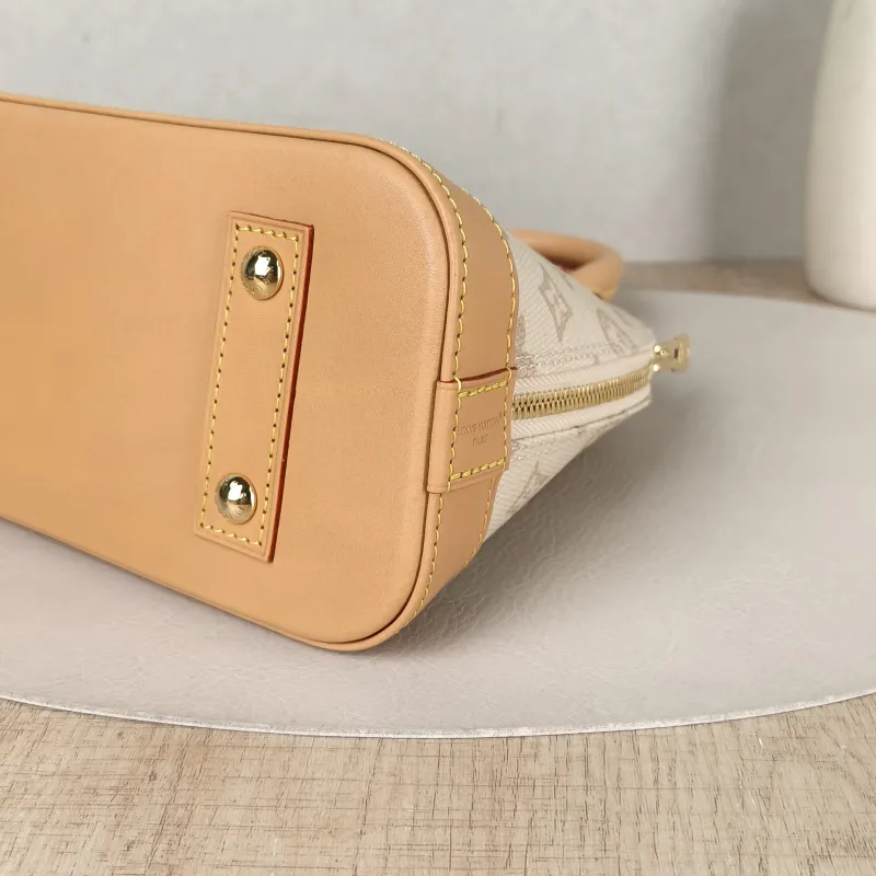 Louis Vuitton Top Handle Bag Alma BB PVCBB23.5 × 11.5 × 17.5 cm — detail view 5 of 12