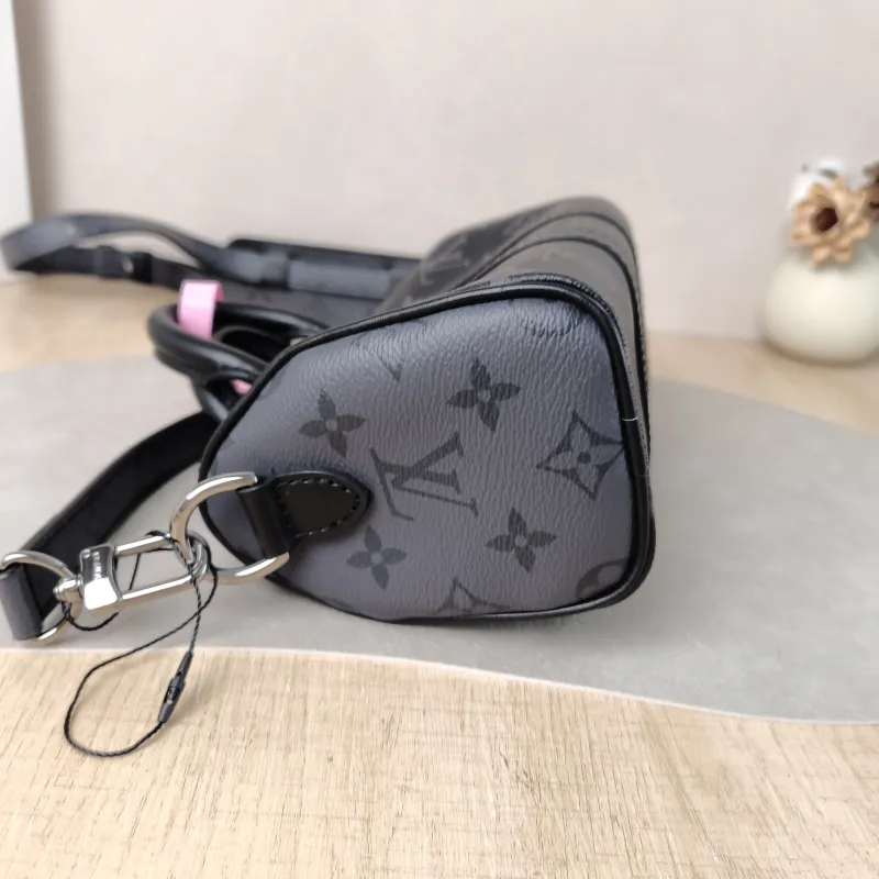 Louis Vuitton Crossbody Bag Keepall XS Monogram PVC Mini 21 × 9 × 12 cm — detail view 1 of 10