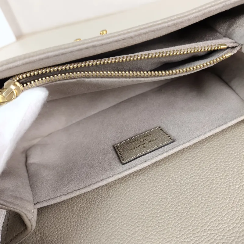 Louis Vuitton Crossbody Bag Pochette Métis East West Monogram Empreinte Embossed Calfskin Small 21.5 × 6 × 13.5 cm — detail view 4 of 13