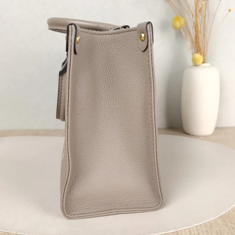 Louis Vuitton Shoulder Bag Onthego · White Monogram Empreinte Embossed Calfskin Small 25 × 11.5 × 19 cm — detail view 12 of 12