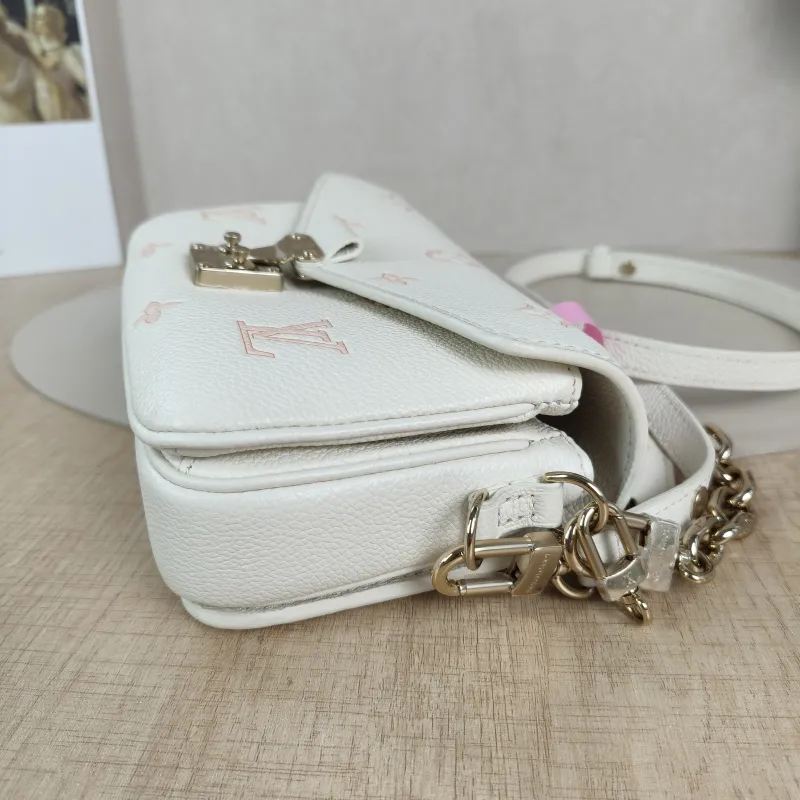 Louis Vuitton Crossbody Bag Pochette Métis East West White · Pink Monogram Empreinte Embossed Calfskin Small21.5 × 6 × 13.5 cm — detail view 9 of 13