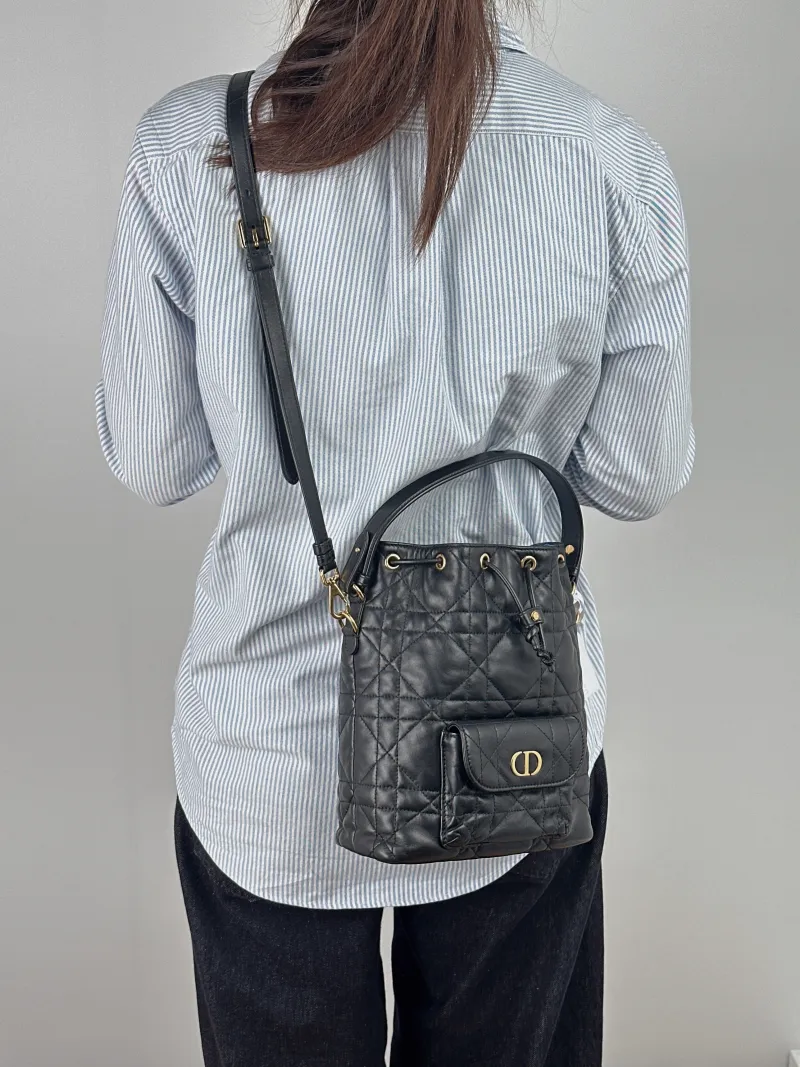 DIOR Crossbody Bag Caro Bucket Bag Black Lambskin Small 20 × 9 × 24 cm — on-model view 2 of 3