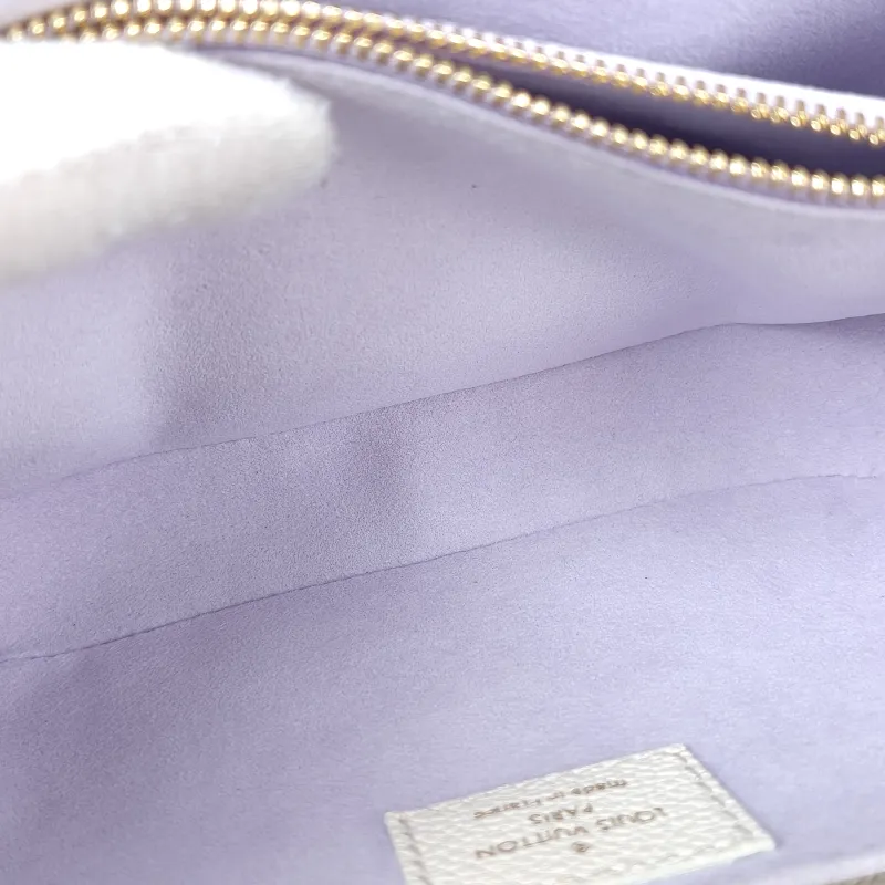Louis Vuitton Crossbody Bag Pochette Métis East West White · Empreinte Embossed Calfskin Small 21.5 × 6 × 13.5 cm — detail view 11 of 14