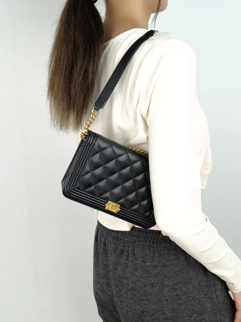 Chanel Crossbody Bag Le Boy​ WOC Black Grained Calfskinmini19.2 × 3.5 × 12.3 cm — on-model view 2 of 3