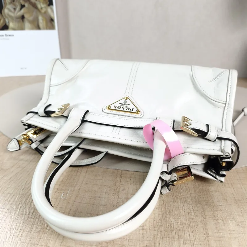 PRADA Top Handle Bag Bonnie Soft Lux White Waxed Leather Mini 23.5 × 9 × 12 cm — detail view 9 of 14