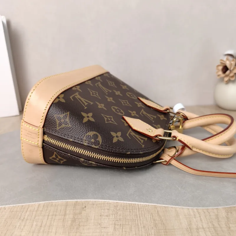 Louis Vuitton Crossbody Bag Alma BB Monogram PVC BB 23.5 × 11.5 × 17.5 cm — detail view 2 of 12