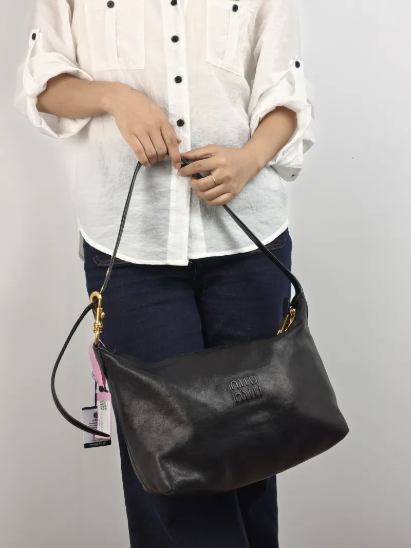 Miumiu Top Handle Bag Spirit Vanity Case Bag Cosmetic Bag Black Lambskin Medium 28 × 13 × 21.5 cm — on-model view 1 of 2